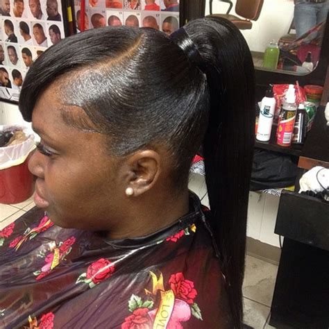 Easy ponytail hairstyles with chignons. African American Ponytail Hairstyles | African American ...