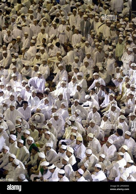 Indonesian Muslim Gather To Pray For Their Nation During A Mass As It Celebrate Its 60th