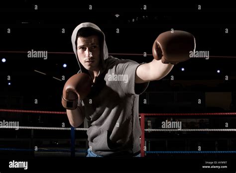 Boxer Punching Training In Boxing Ring Stock Photo Alamy