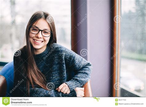Portrait Of Pretty Young Woman Wearing Eyeglasses Stock Photo Image