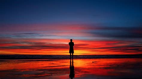 Download Wallpaper 1366x768 Calm Peace Silhouette Reflections Man