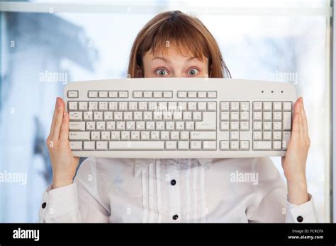 Woman Holding Keyboard Stock Photo Alamy
