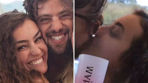 Rafael Cardoso e Vivian Linhares surgem aos beijos em aniversário da