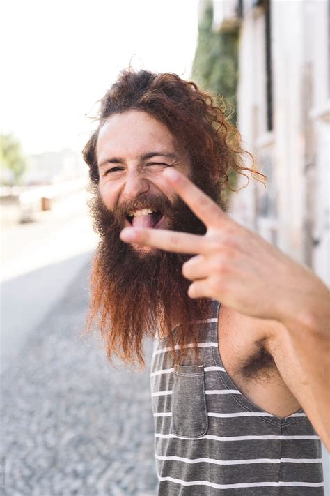 Happy Long Beard Redhead Man Portrait In The City By Stocksy Contributor Simone Wave Stocksy