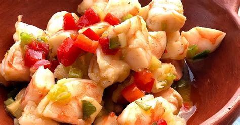 Glass serving bowl, combine shrimp, onion, lemons and olives. Nobody Puts Mama In A Corner!: Marinated Shrimp Appetizer!