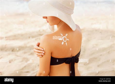 Beautiful Woman In Bikini Applying Sun Cream On Tanned Shoulder Sun Protection Skin And Body