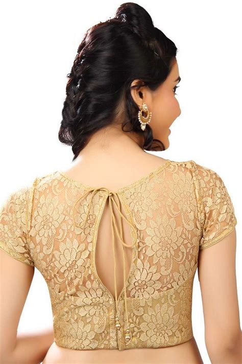 It is mainly men hardly undergo with gold colour tattoos. #Gold lace fabric designer #blouse with lovely #jewel neck ...