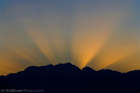 Crepuscular Sun Rays Above Mount Constance Olympic Mountains Wa