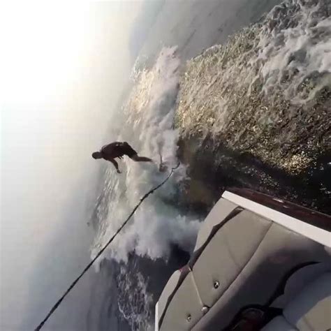 Guy Loses Balance And Falls Into Water When Friend Tries To Climb Out Of Boat Jukin Media Inc