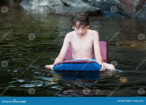 Boy Swiming In A Lake Stock Photo Image Of Childhood 54072466