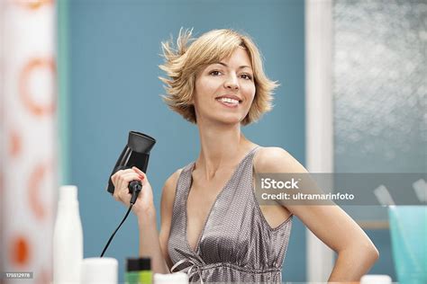 Beautiful Woman Drying Hwe Hair Stock Photo Download Image Now Hair