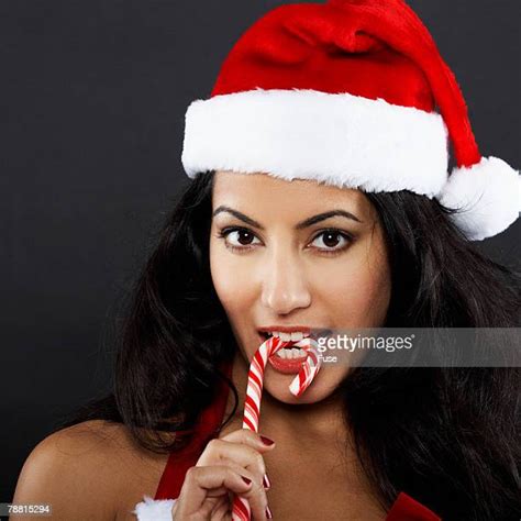 Eating Candy Cane Photos And Premium High Res Pictures Getty Images