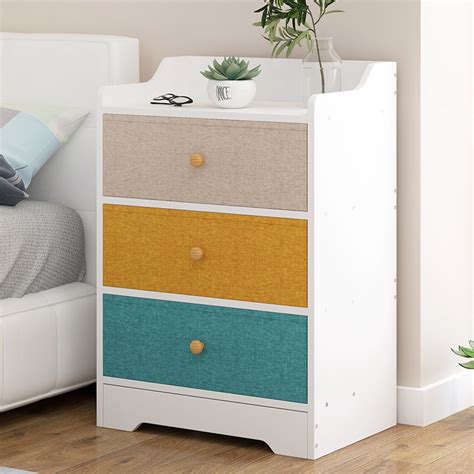 These ingenious products slip under your mattress and features pockets for holding and. Simple Modern Storage Cabinet Bedside Cabinet Creative ...