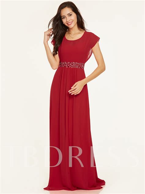 Side ruching and a mini hem complete the look. Scoop Neck Cap Sleeves Beaded A Line Evening Dress ...