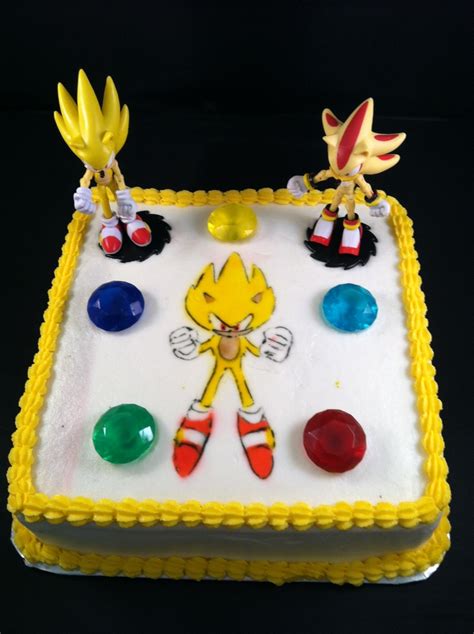 Hand painted poster board character heads, yellow plastic bowls with the bottoms cut out for the rings. Sonic Birthday Cakes