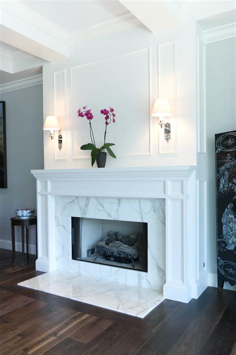 Striking Marble Fireplace In Transitional Living Room Transitional