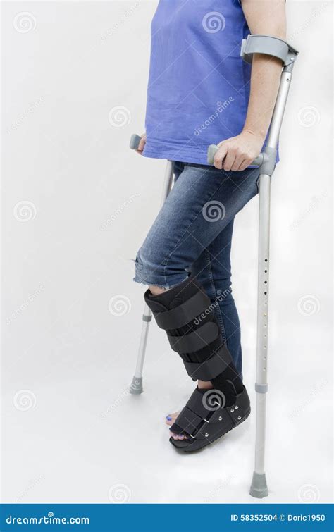 Broken Leg With Support Boot And Crutches Stock Photo Image 58352504