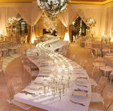 All White Garden Rose Wedding Tablescape With Serpentine Tables White