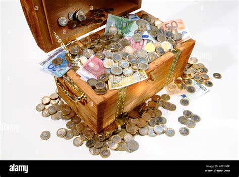 A Treasure Chest Filled With Money Stock Photo Alamy