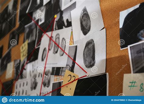 Detective Board With Crime Scene Photos Stickers Clues And Red Thread