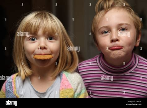 Children Making Funny Faces Model Released Stock Photo Alamy