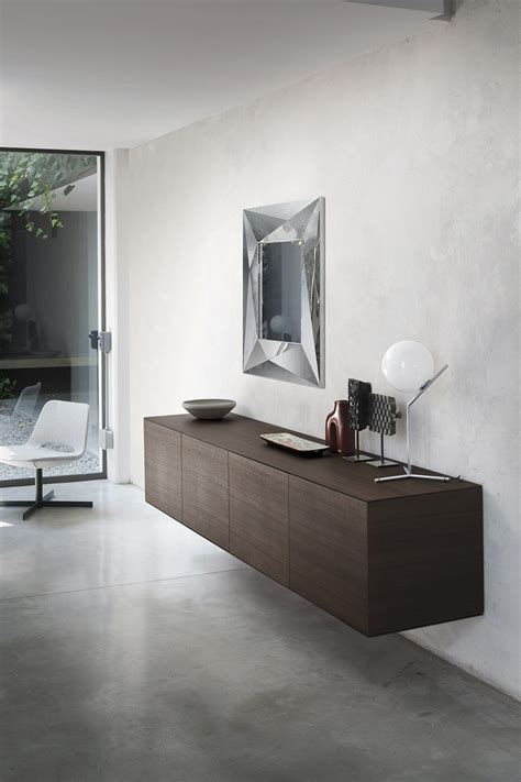 Il comodino è progettato per galleggiare sul muro, attaccato alla parete, massimizzando lutilizzo dello spazio in piccole camere da letto. Mobile basso per il soggiorno: la madia contemporanea ...