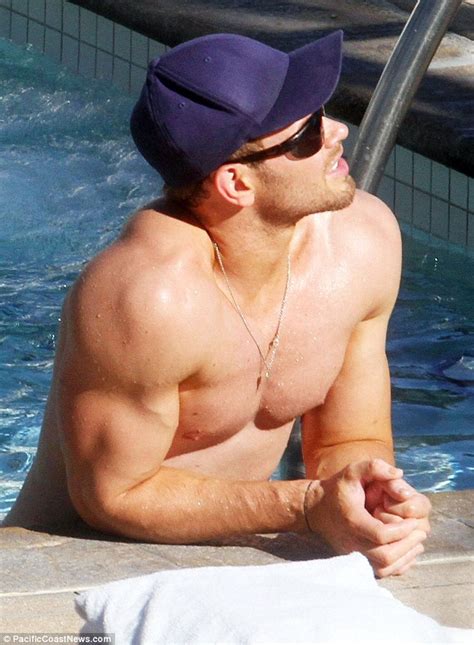 Kellan Lutz Shows Off His Impeccable Physique As He Relaxes Poolside