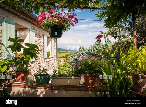 Provence Panoramic Terrace With Flowers Overlooking The Field Of