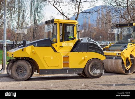 Road Construction Vehicles Yellow Road Roller Stock Photo Alamy