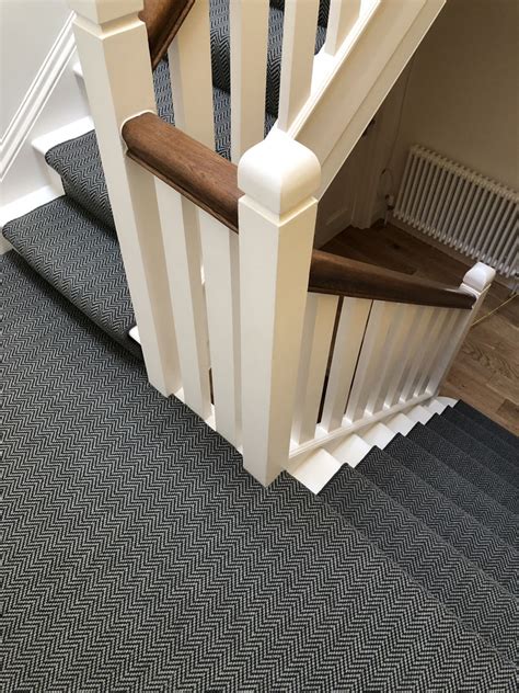 For a cozy vibe and a natural sense of calm, dark carpet is a fine choice. Dark Grey Sisal Herringbone Carpet Fitted In Holloway | The Flooring Group