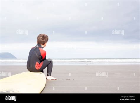 Boy Sitting Alone Beach Hi Res Stock Photography And Images Alamy