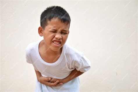 Premium Photo Asian Boy Stomach Ache From Stomach Disease