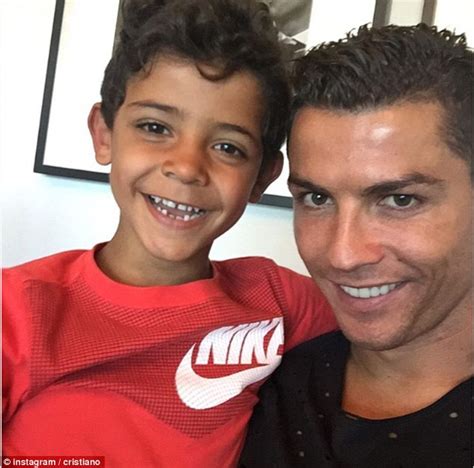 Cristiano ronaldo dos santos aveiro. Ronaldo's son Cristiano Jr cheers footballer on during ...