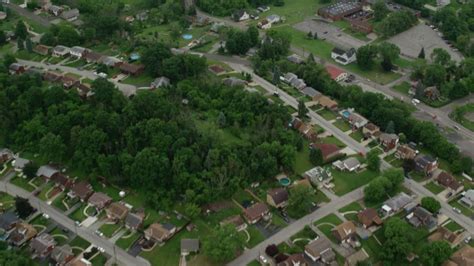 48k Stock Footage Aerial Video Flying Over A River Revealing A Dam