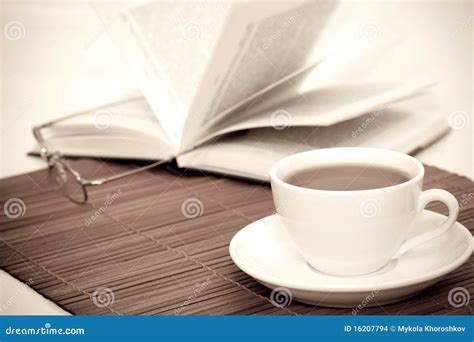 White Cup Of Coffee And Book With Glasses Stock Images Image 16207794
