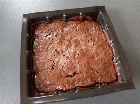 A Cake In A Pan Sitting On Top Of A Table