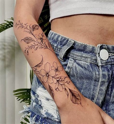 Arm Wrap Tattoo Wrap Around Wrist Tattoos Wrap Around Tattoo Flower