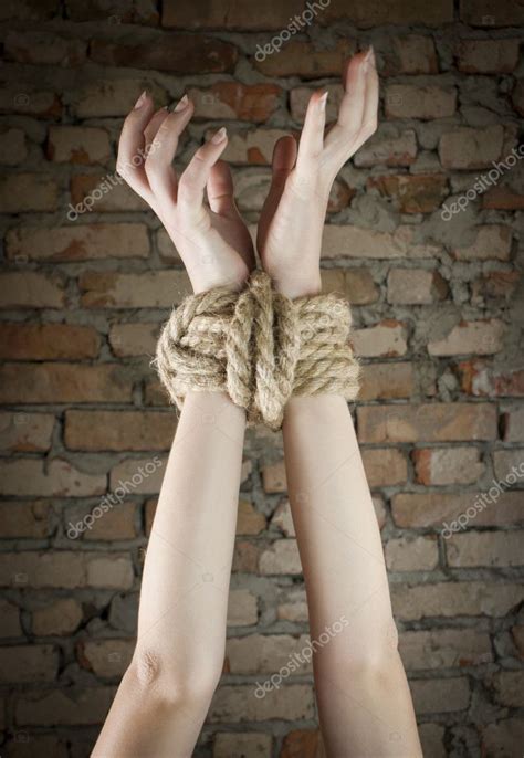 Hands Tied Up With Rope Stock Photo By Andreykr