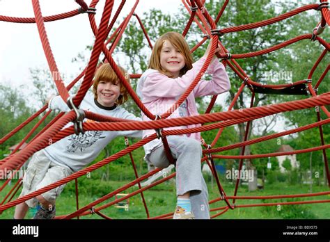Children Climbing At A Playground Stock Photo Alamy