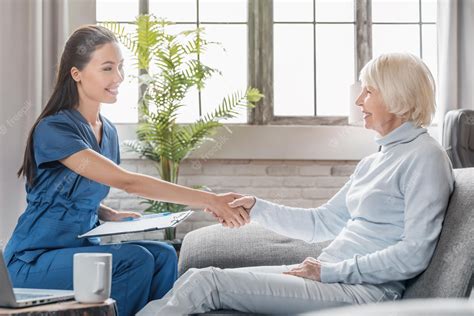 Premium Photo Mature Woman Thanking Caregiver For Help And Support