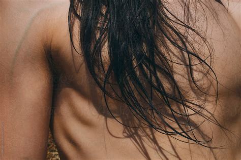 Tanned Naked Male Torso And Long Black Hair By Stocksy Contributor
