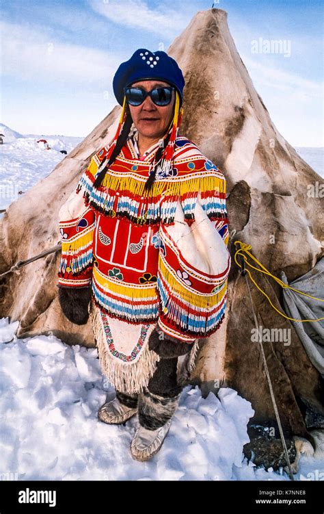 Inuit Woman Wearing Ceremonial Amouti Parka Handmade Of Caribou Skin