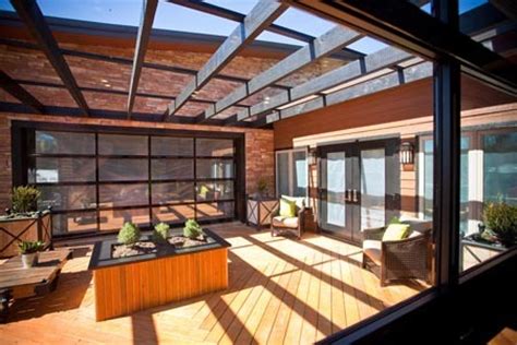 What architectural designs work best with glass garage doors? Clopay Door Blog | Glass Garage Doors Open Up Interior Spaces