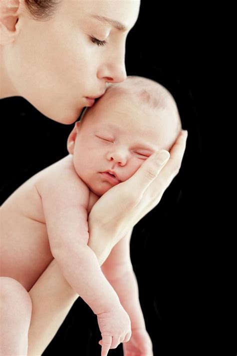 Mother Kissing Newborn Baby Photograph By Ian Hootonscience Photo