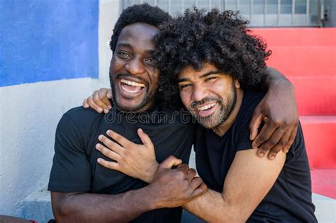 Cheerful Black Sportsmen Hugging On Street Stock Photo Image Of