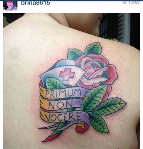 A Woman With A Tattoo On Her Back That Says Premium Non Nocce