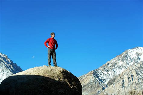 Man Standing On Top Of A Boulder Photograph By Corey Rich Fine Art