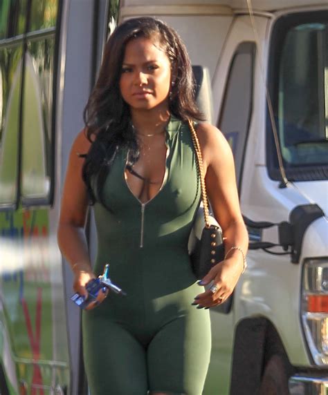 Braless Christina Milian Displays Her Cleavage In Deeply Plunging Catsuit Bootymotiontv