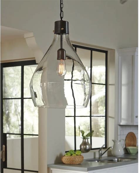Avalbane Clear And Gray Glass Pendant Light By Ashley Furniture Stopbedrooms