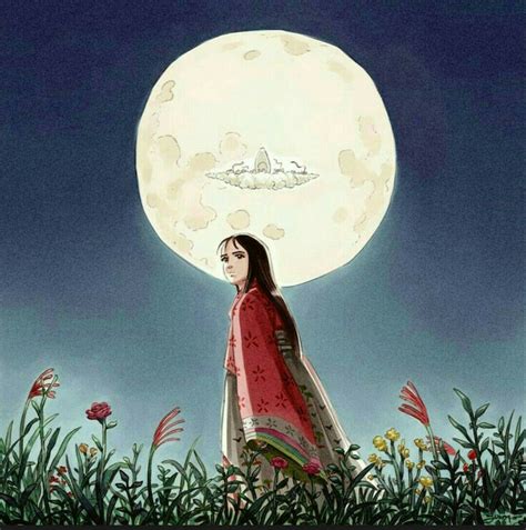 A Woman Standing In The Grass Under A Full Moon